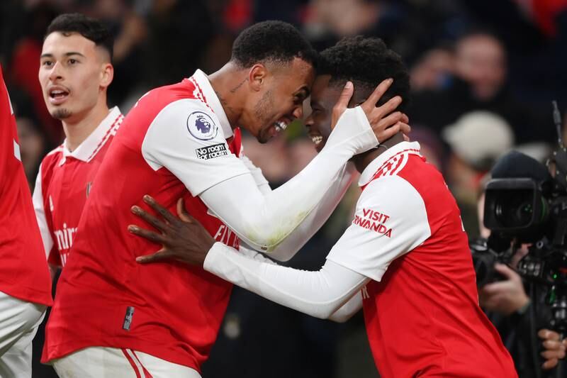 Bukayo Saka celebrates with Gabriel after scoring Arsenal's second goal. Getty