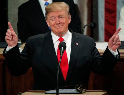 Donald Trump gestures during his State of the Union address. Reuters