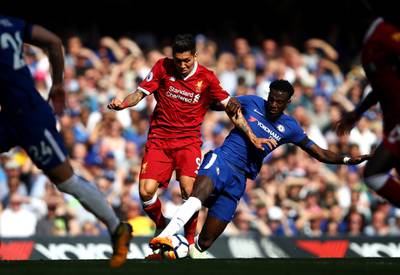 Striker: Roberto Firmino (Liverpool) – Salah’s selfless foil scored more goals than ever before, created plenty and helped reinvent the striker’s role with relentless pressing. Julian Finney / Getty Images