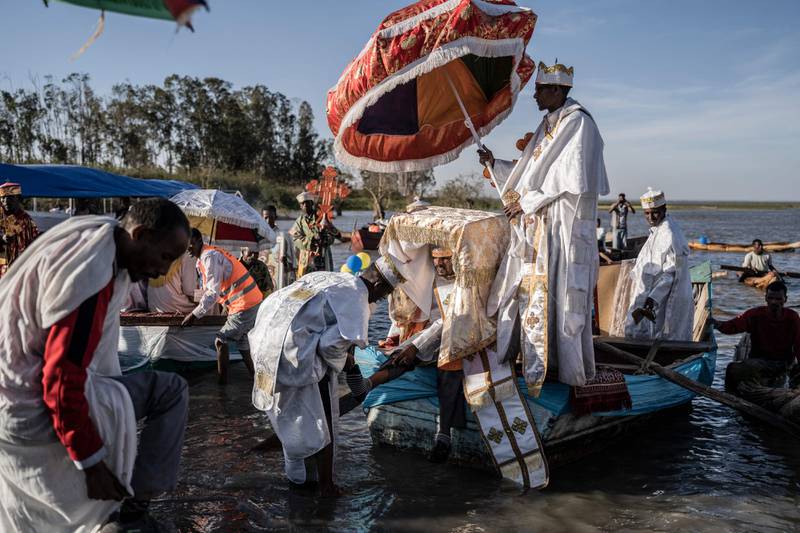 Priests celebrate Timkat (the Ethiopian epiphany) with the Ark of the Covenant on a lake near Batu, Ethiopia. AFP