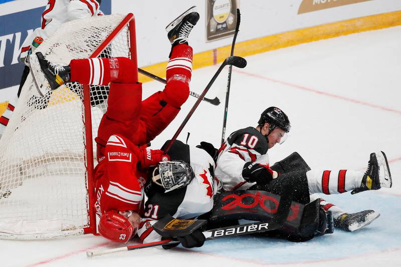 A player pile-up during the Channel One Cup match between Russia and Canada at the CSKA Arena, Moscow, on December 15. Reuters