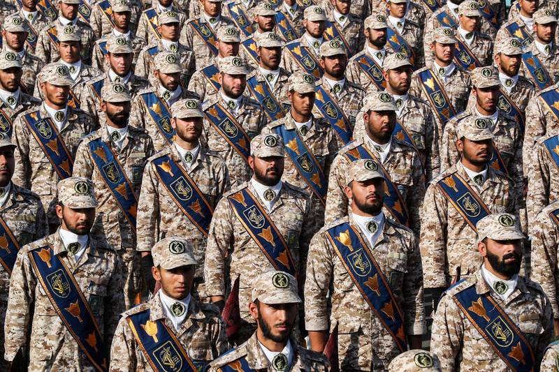 A handout picture provided by the Iranian presidency on September 22, 2019 shows members of Iran's Islamic Revolutionary Guard Corps (IRGC) standing in formation during the annual "Sacred Defence Week" military parade marking the anniversary of the outbreak of the devastating 1980-1988 war with Saddam Hussein's Iraq, in the capital Tehran. - Rouhani said on September 22 that the presence of foreign forces creates "insecurity" in the Gulf, after the US ordered the deployment of more troops to the region. "Foreign forces can cause problems and insecurity for our people and for our region," Rouhani said in a televised speech at the annual military parade, adding that Iran would present to the UN a regional cooperation plan for peace. (Photo by - / Iranian Presidency / AFP) / === RESTRICTED TO EDITORIAL USE - MANDATORY CREDIT "AFP PHOTO / HO / IRANIAN PRESIDENCY" - NO MARKETING NO ADVERTISING CAMPAIGNS - DISTRIBUTED AS A SERVICE TO CLIENTS ===
