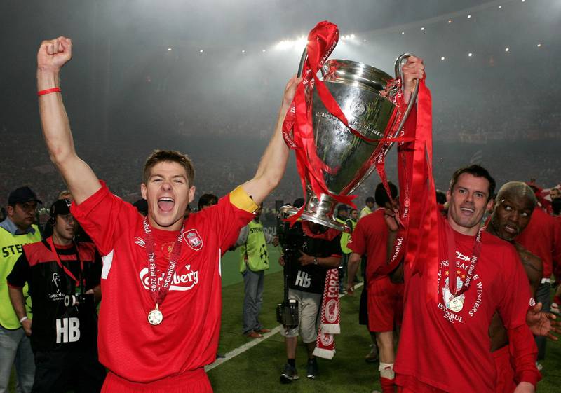 ISTANBUL, TURKEY - MAY 25:  Liverpool captain Steven Gerrard (L) and defender Jamie Carragher lift the European Cup after Liverpool won the European Champions League final against AC Milan on May 25, 2005 at the Ataturk Olympic Stadium in Istanbul, Turkey.  (Photo by Clive Brunskill/Getty Images)