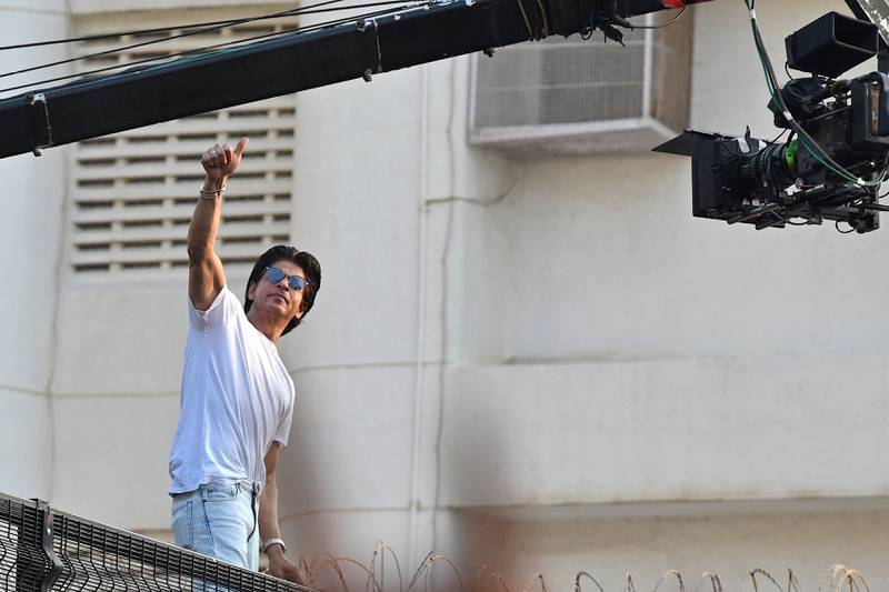 Bollywood actor Shah Rukh Khan greets fans during his birthday celebrations at his residence Mannat in Mumbai on November 2, 2022. AFP