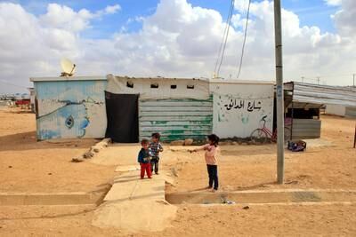 Syrian children stand at Zaatari refugee camp, north Jordan, 19 November 2021. EPA