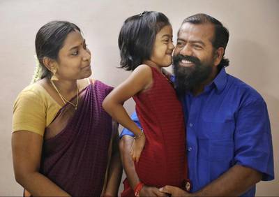 Capt Ayyappan Swaminathan at home in India with his wife Menaga and daughter Aniha. Courtesy Mission to Seafarers
