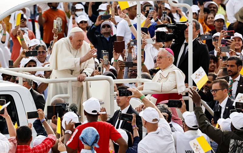Pope Francis greets people as he attends a holy mass at Bahrain National Stadium during his apostolic journey, in Riffa, Bahrain. Reuters