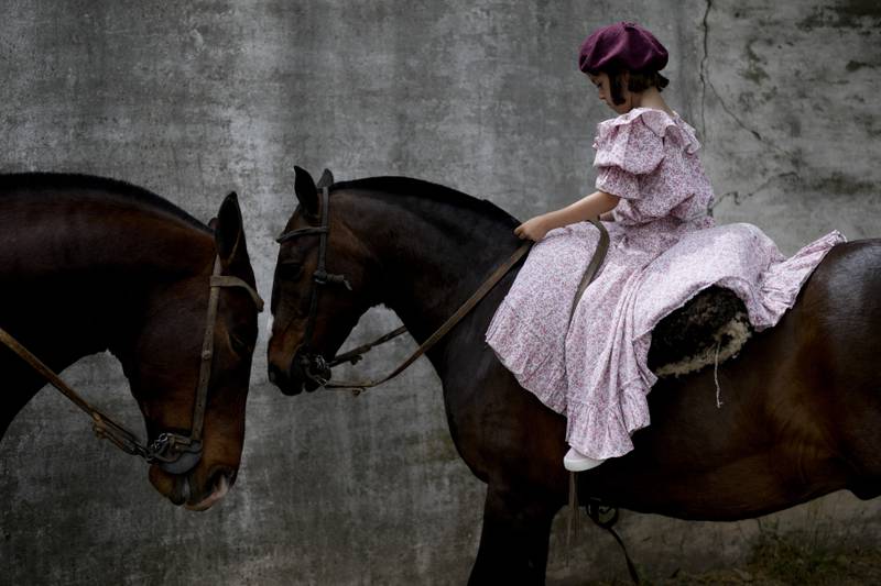 A girl rides during Tradition Day, which aims to preserve the gaucho culture of Argentina, in San Antonio de Areco. AP Photo