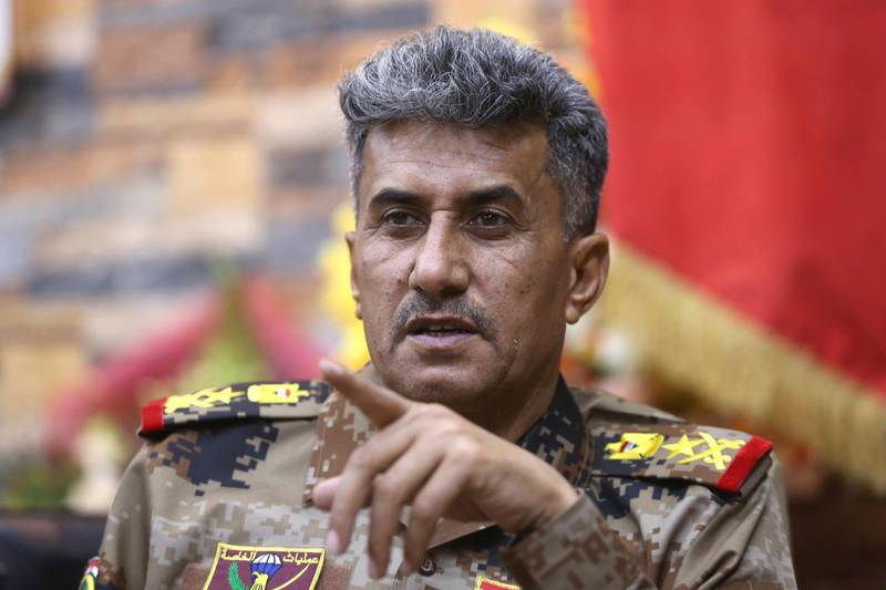 FILE - In this June 27, 2016, file photo, Lt. General Abdul-Wahab al-Saadi, commander for the Iraqi counterterrorism forces' operation to re-take Fallujah from Islamic State militants, speaks during an interview with The Associated Press at a military camp outside Fallujah, Iraq. Iraq's Prime Minister Adel Abdul-Mahdi on Friday, Sept. 27, 2019 removed Lt. Gen. Abdul-Wahab al-Saadi from his post as the commander of the country's elite counterterrorism forces and transferring him to the Defense Ministry, without providing an explanation. (AP Photo/Hadi Mizban, File)