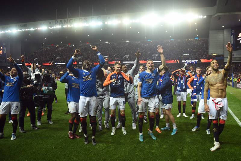 Rangers' players celebrate after the match in Glasgow. AFP