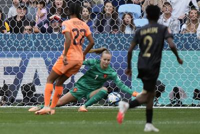 Netherlands' goalkeeper Daphne van Domselaar makes a save during the Women's World Cup round of 16 match against South Africa in Sydney. AP