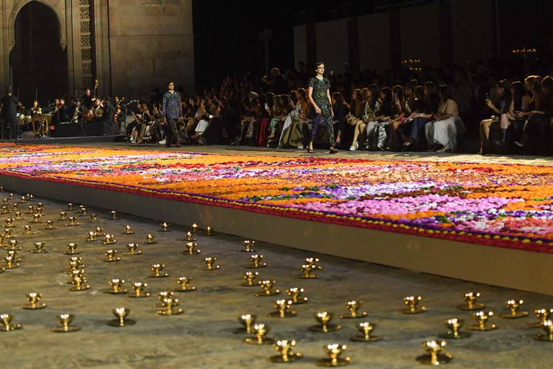 A carpet of flowers ran along each side of the runway