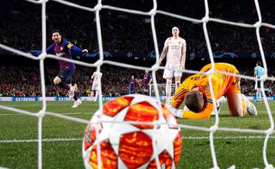 Barcelona's Lionel Messi celebrates scoring his second goal. Reuters