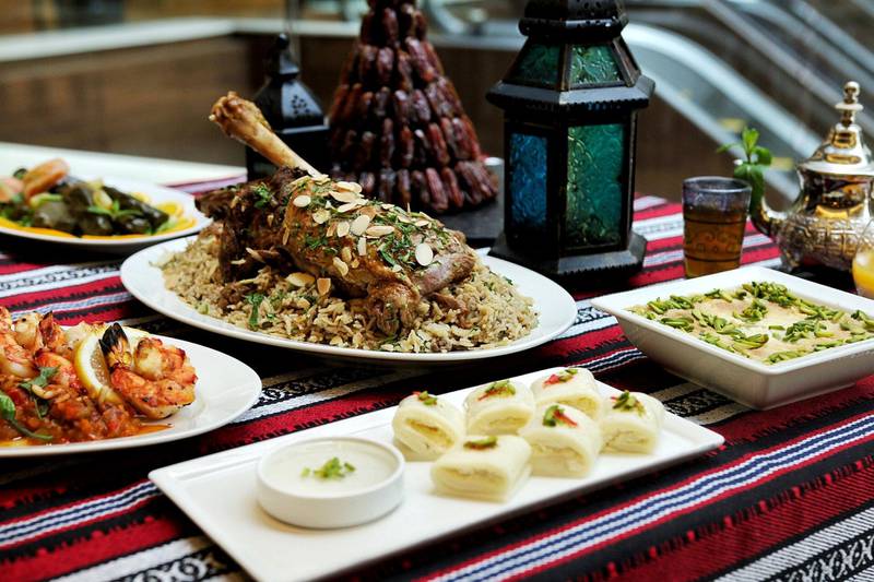 <p>Iftar dishes, including lamb ouzi, at Dusit Thani</p>
