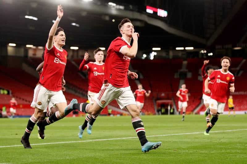 Charlie McNeill of Manchester United celebrates after scoring the third goal during the FA Youth Cup semi-final against Wolverhampton Wanderers at Old Trafford. Getty