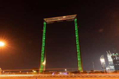 The Dubai Frame lights up in green to celebrate the commencement of commercial operations at Unit 1 of Barakah Nuclear Energy Plant, a major step towards the UAE achieving its clean energy ambitions.. Wam