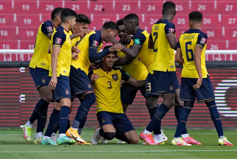 Ecuador's Piero Hincapie celebrates with teammates after scoring against Venezuela during the World Cup qualifie in Quito on November 11, 2021. AFP