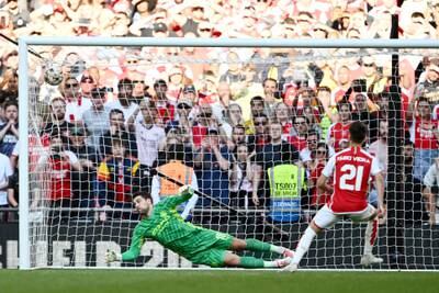 Fabio Vieira of Arsenal scores the winning penalty. Getty 