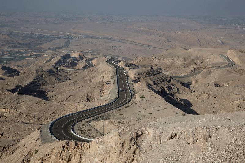 AL Hayer, UNITED ARAB EMIRATES, Dec. 29, 2014:  
Cars climb up the windy road up toward the Jebel Hafeet (1,249 m /4,098 ft) mountain, which rises up on the outskirts of Al Ain at the UAE-Oman border. Jebel Hafeet is one of the UAE's tallest mountains and a very popular attraction for tourists and locals alike. (Silvia Razgova / The National)  /  Usage:  undated  /  Section: AL   /  Reporter:  standalone *** Local Caption ***  SR-141229-jebelhafeet04.jpg
