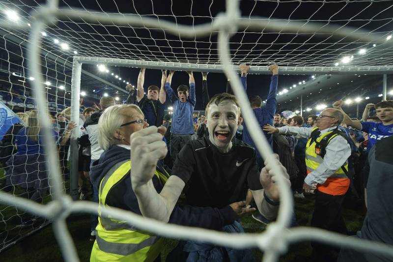 Everton fans celebrate the victory against Palace. AP