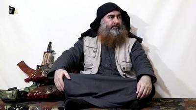 FILE PHOTO: A bearded man with Islamic State leader Abu Bakr al-Baghdadi's appearance speaks in this screen grab taken from video released on April 29, 2019. Islamic State Group/Al Furqan Media Network/Reuters TV via REUTERS. THIS IMAGE HAS BEEN SUPPLIED BY A THIRD PARTY. THE AUTHENTICITY AND DATE OF THE RECORDING COULD NOT BE INDEPENDENTLY VERIFIED BY REUTERS/File Photo