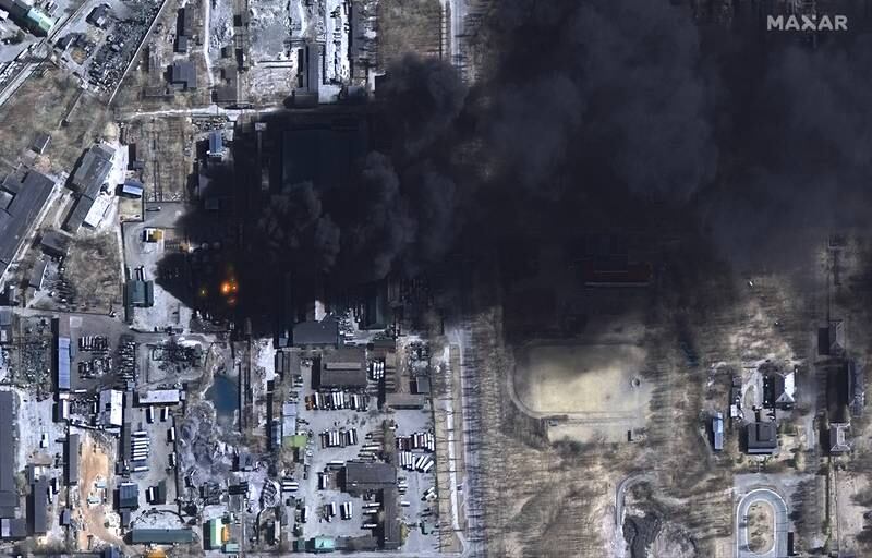 Oil storage tanks burn in Chernihiv, Ukraine, in a satellite image from Maxar Technologies. EPA