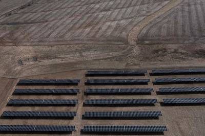 An aerial view of a solar farm next to farmland in New Florence, Missouri. AFP