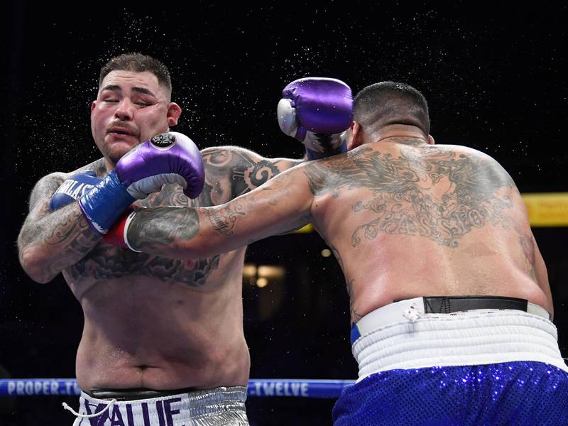Andy Ruiz takes a punch from Chris Arreola. AFP