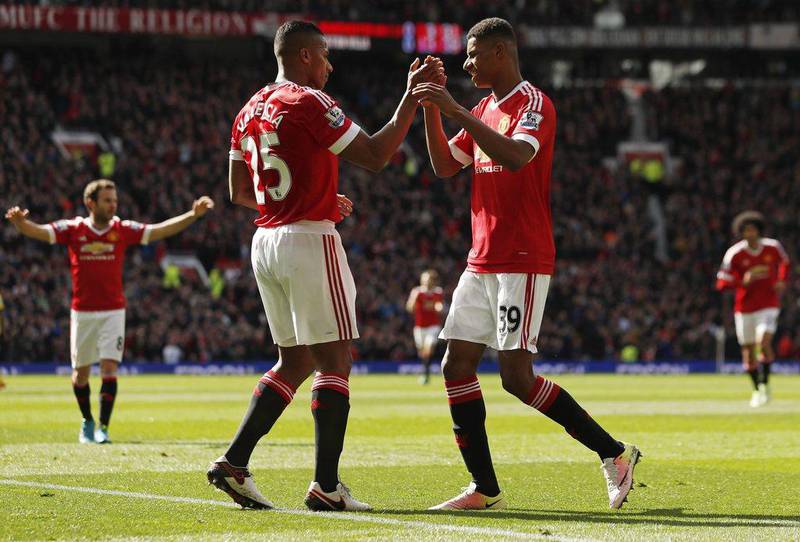 Marcus Rashford celebrates with Antonio Valencia after scoring the first goal for Manchester United. Action Images via Reuters / Jason Cairnduff