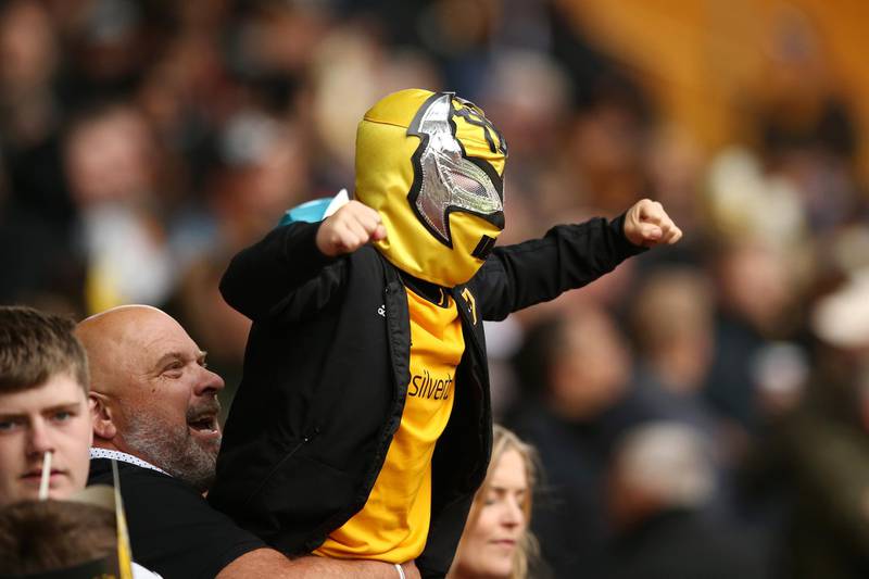 A Wolverhampton Wanderers fan shows his support during the Premier League match between Wolverhampton Wanderers and Fulham at Molineux on May 4. Getty Images