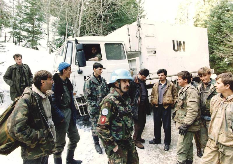 Dutch soldiers of a Dutchbat convoy chat with Bosnian Muslim fighters in Vares, Bosnia and Herzegovina, 01 March 1994. EPA
