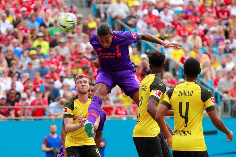 Liverpool's Virgil van Dijk scores a goal. Reuters