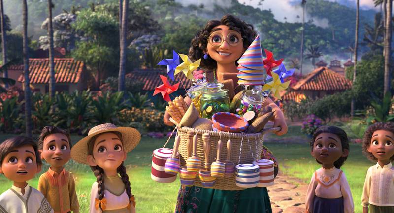 Mirabel, voiced by Stephanie Beatriz, in a scene from the animated film 'Encanto', which is up for three awards. Disney via AP