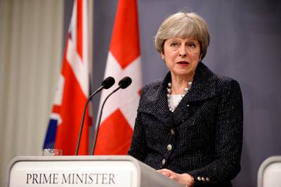 Britain's Prime Minister Theresa May speaks during a joint press conference with Danish Prime Minister following talks at Christiansborg Castle in Copenhagen, Denmark, on April 9, 2018. / AFP PHOTO / Ritzau Scanpix AND Scanpix / Mads Claus Rasmussen / Denmark OUT