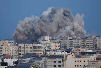 Smoke rises following an Israeli airstrike in Gaza City. AP