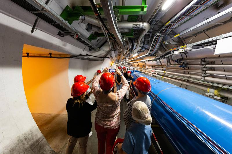 Visitors take pictures at the tunnels during an open day at the CERN particle physics research facility in Meyrin, Switzerland. Getty Images