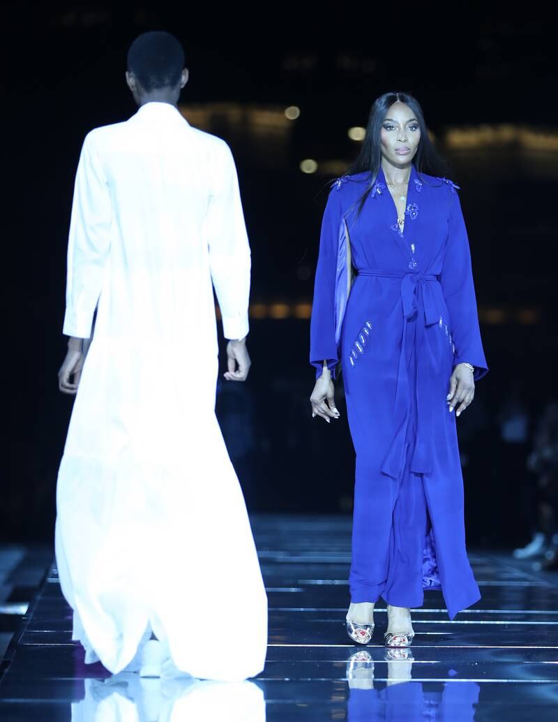 British model Naomi Campbell presents a creation by Nigerian designer Hudayya during Arise Fashion Week at Expo 2020 Dubai on December 3, 2021. EPA