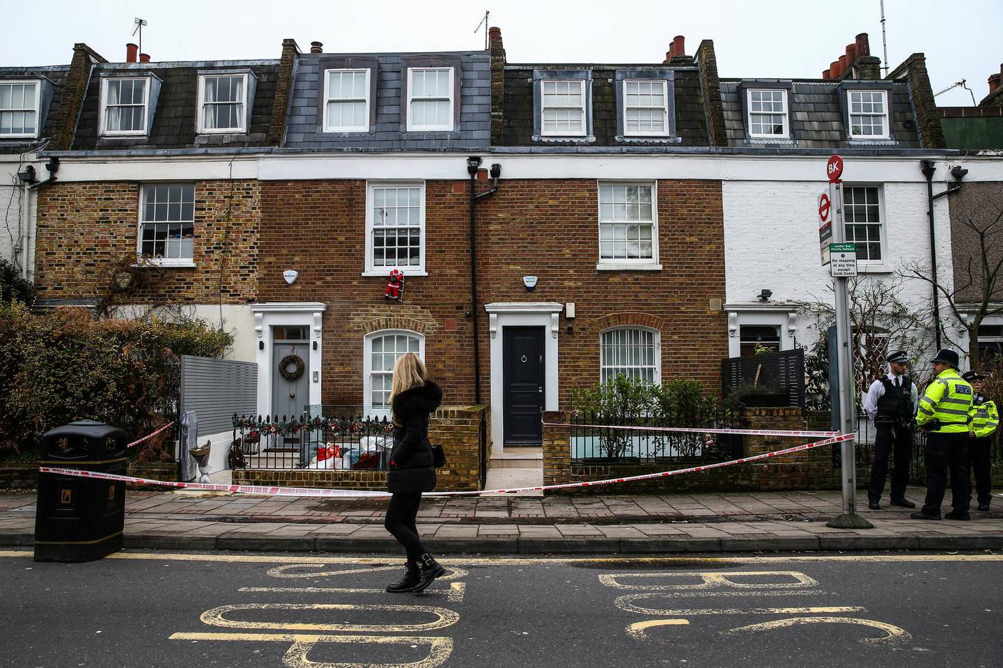 LONDON, ENGLAND - DECEMBER 27: Police stand outside the crime scene where Flamur Beqiri, 36, a father of one, was murdered on December 27, 2019 in south-west London, England. Beqiri was shot dead outside his home on Battersea Church Road on Christmas Eve. The Swedish national is the brother of former Real Housewives of Cheshire star Misse Beqiri. (Photo by Hollie Adams/Getty Images)