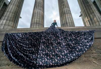 Jonny Hawkins in character as 'Maureen', star of the show of the same name at the National Monument on Calton Hill during the Edinburgh Fringe Festival in Scotland. PA