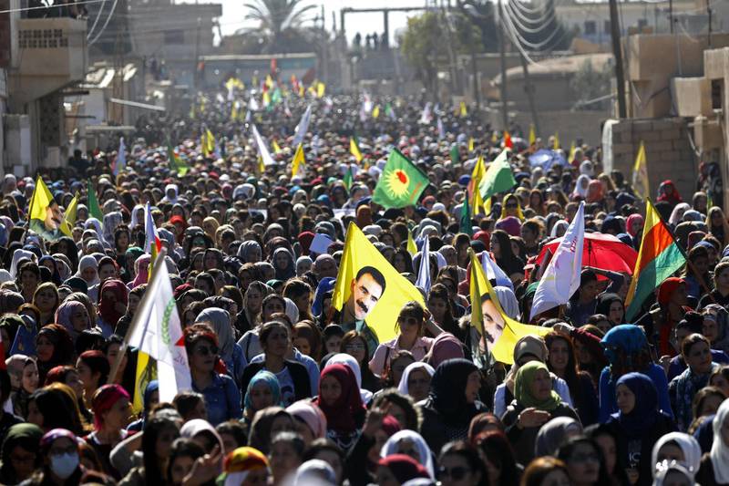 Syrian protesters, mainly Kurds, chant slogans during a demonstration in the town of al-Qahtaniyah, in the Hasakeh province near the Syrian-Turkish border on November 1, 2018, against Turkish attacks on Kurdish militia posts in northern Syria. The Syrian Democratic Forces, joint Arab-Kurdish units under Kurdish command, announced a "temporary halt" to their operation, launched in eastern Syria on September 10, and condemned Turkey's "provocations". 
The previous, Turkish shelling of Kurdish positions in the Kobane sector of northern Syria killed four fighters, according to Turkey's state-run Anadolu news agency. / AFP / Delil souleiman
