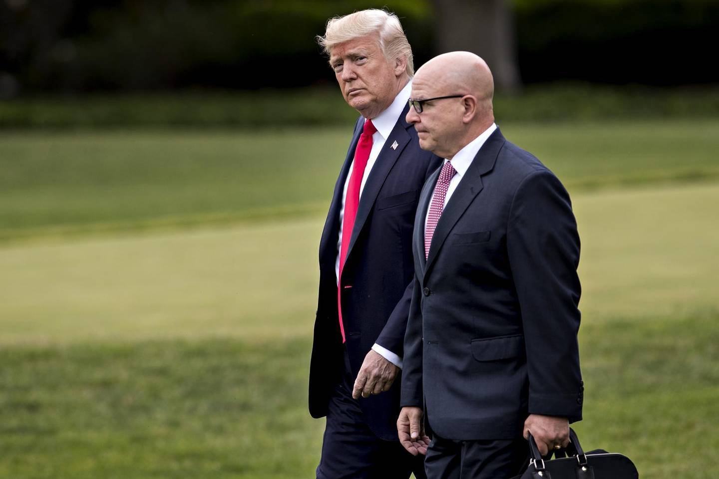 FILE: U.S. President Donald Trump, left, and H.R. McMaster, national security advisor, walk toward Marine One on the South Lawn of the White House in Washington, D.C., U.S., on Friday, June 16, 2017. President Donald Trump is replacing White House National Security Adviser McMaster with John Bolton, a former U.S. Ambassador to the United Nations famed for his hawkish views, in the latest shakeup of his administration. The move installs Trump’s third national security adviser in 14 months. McMaster joined the administration a year ago after Trump fired his predecessor, Michael Flynn, for lying to the vice president about contacts with Russia. Our editors select the best archive images on Bolton and McMaster. Photographer: Andrew Harrer/Bloomberg