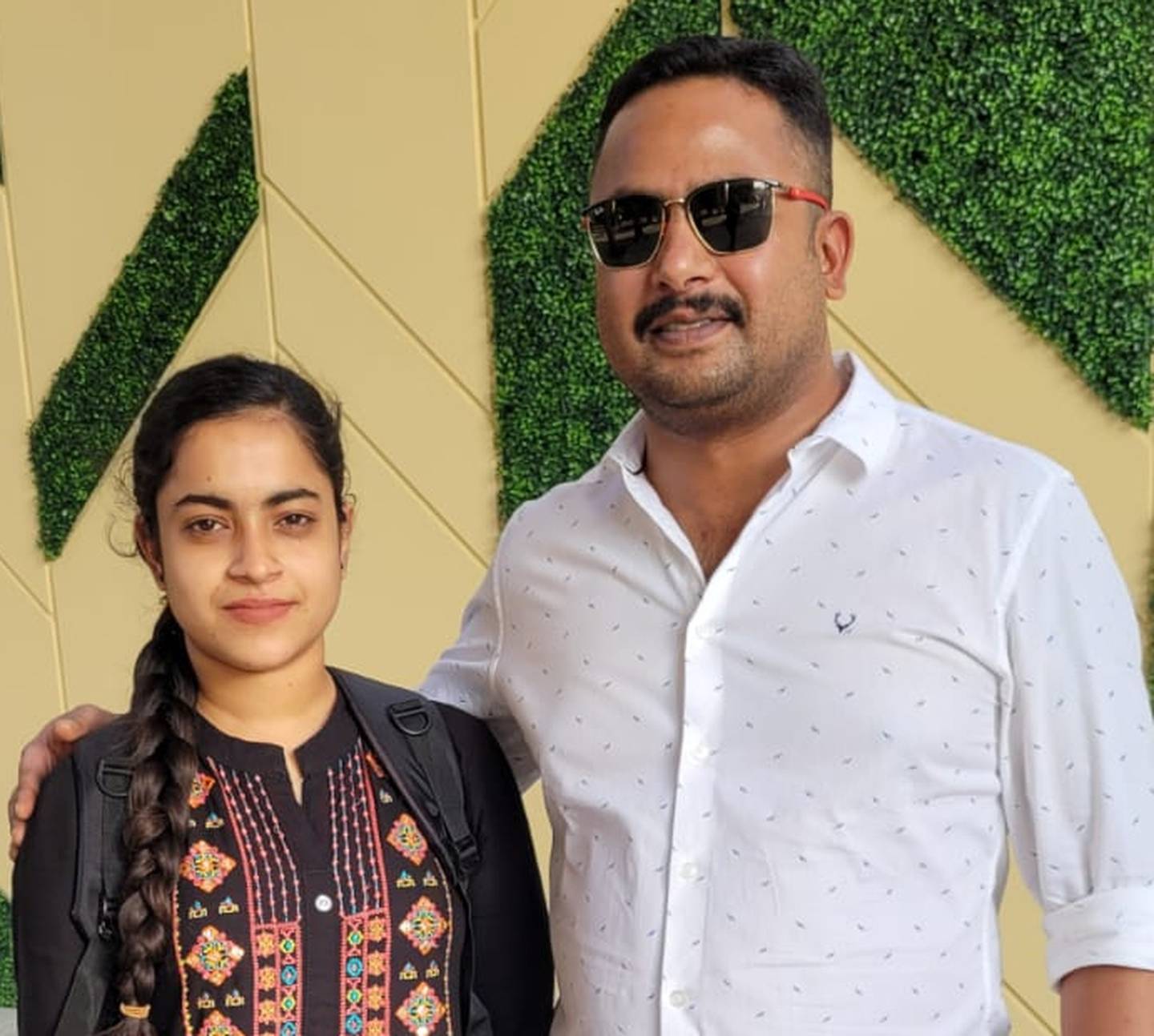 Sushil Kumar and his sister Surya Chandran wait for the display at Al Wasl Dome in Expo City Dubai.