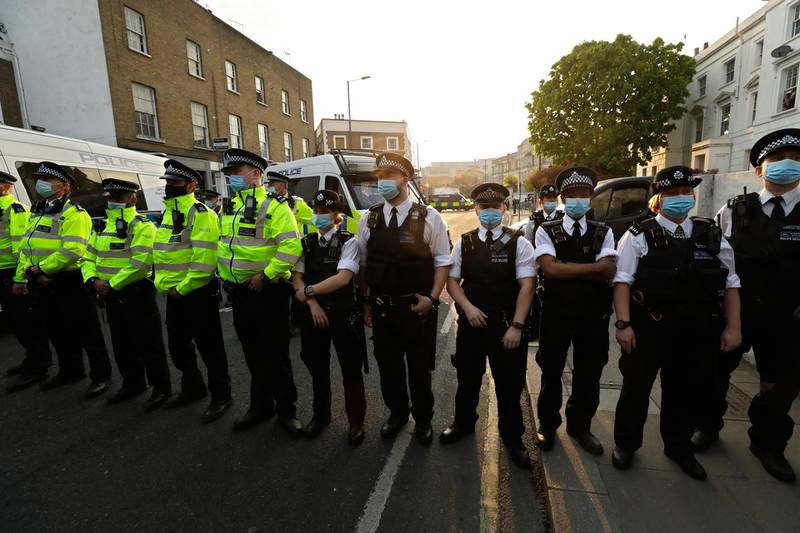 A police line stands outside Stamford Bridge where Chelsea fans were protesting against the proposed new European Super League. AP