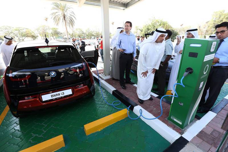 Electric cars on display during the launch of electric car charging station at the Dewa headquarters in Garhoud in Dubai. Pawan Singh / The National