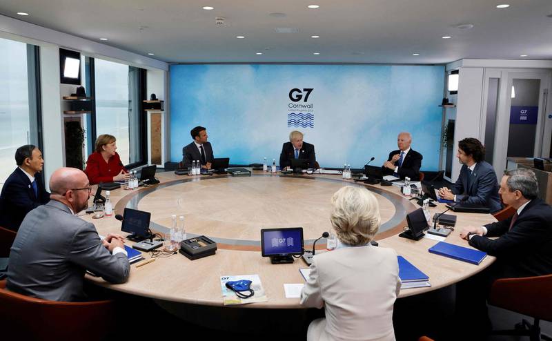The G7 leaders attend a working session in Carbis Bay. AFP