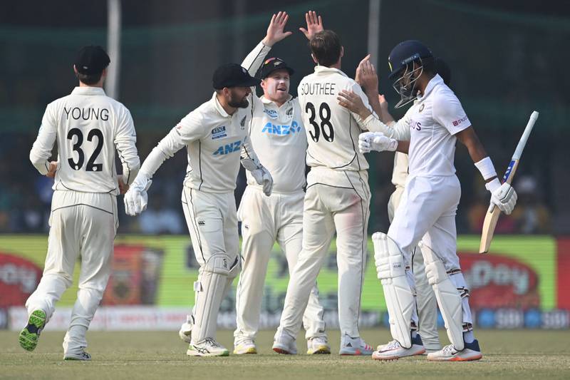 New Zealand celebrate after India's Shreyas Iyer was caught by Tom Blundell off the bowling of Tim Southee. AFP