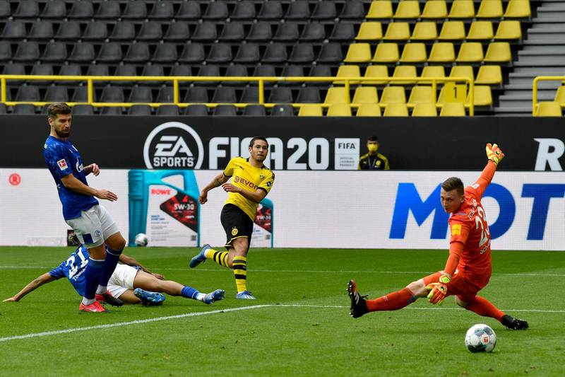 Dortmund's Raphael Guerreiro scores his side's second goal. Getty