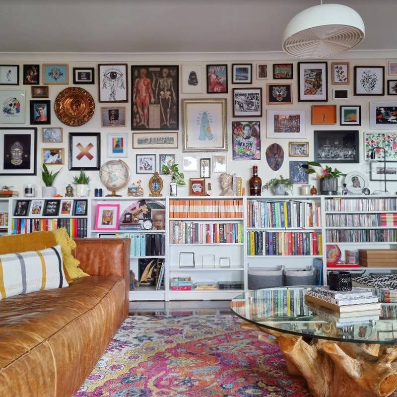 Paula Truscott is an avid thrift shopper, and displays her finds on a gallery wall and shelf in her home. Photo: Paula Truscott