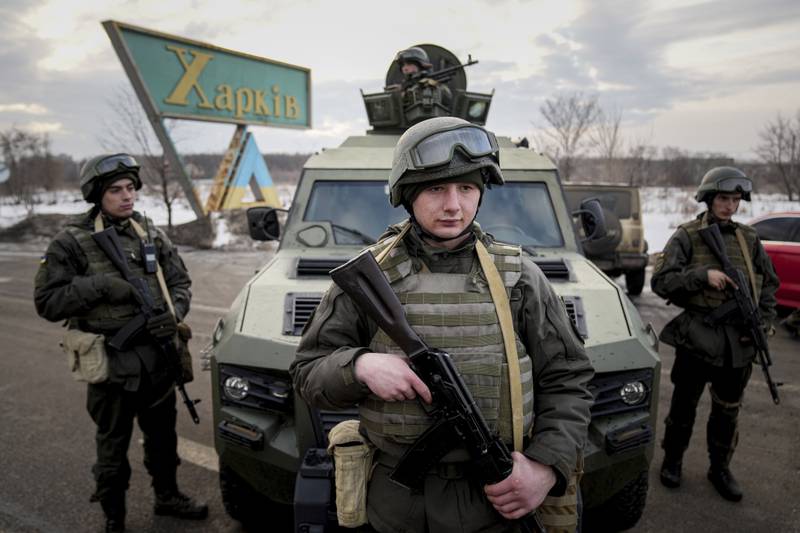 Ukrainian National Guard soldiers at a mobile checkpoint together with the Ukrainian Security Service agents and police officers during a joint operation in Kharkiv, Ukraine. AP