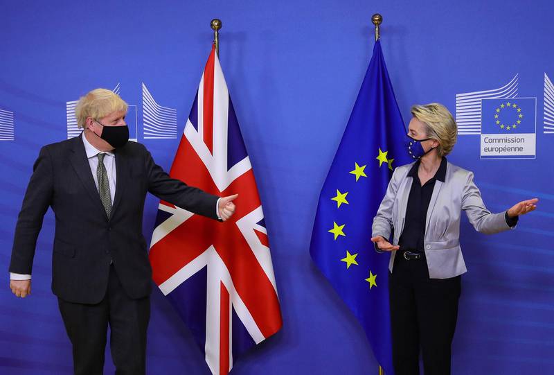 Britain's Prime Minister Boris Johnson is welcomed by European Commission President Ursula von der Leyen in the Berlaymont building at the EU headquarters in Brussels. AFP